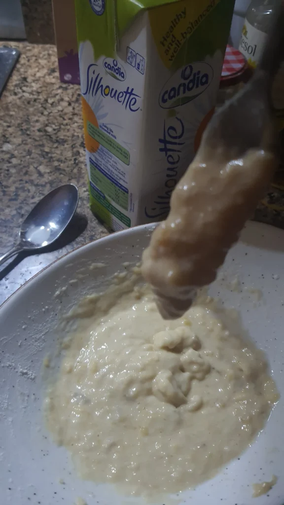 Consistency of banana fritter (gato banane) batter.